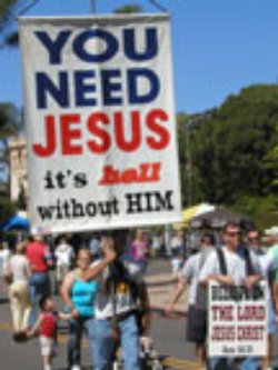 Man holding jesus sign