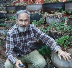 Rod in front of earthship